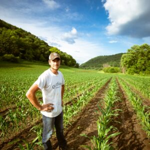 man standing on garden during daytime